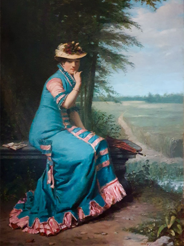 Elegante dame in de tuin van een veluws landgoed